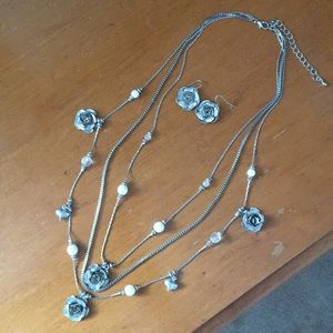 Layered back lace with matching earrings.